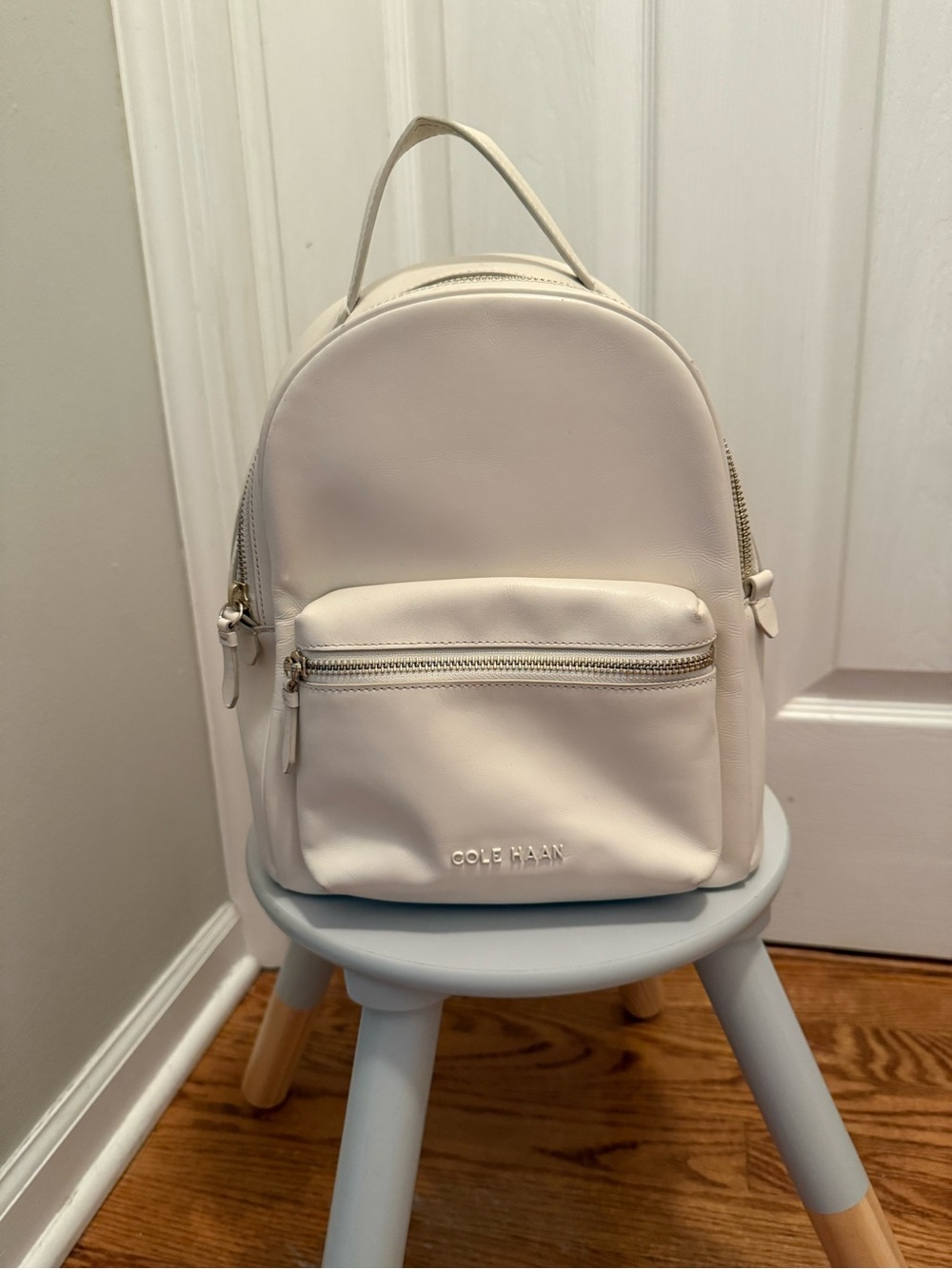 Cole Haan Cream Mini Backpack with Front Zip Pocket